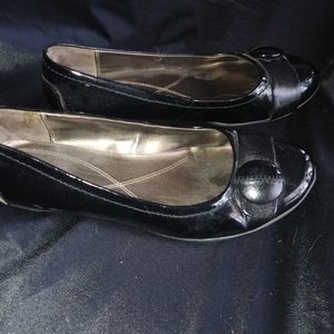 Shiny black flats